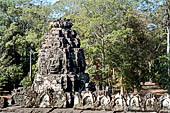 Angkor Thom - Bayon temple, second enclosure, corner towers seen from the central terrace 